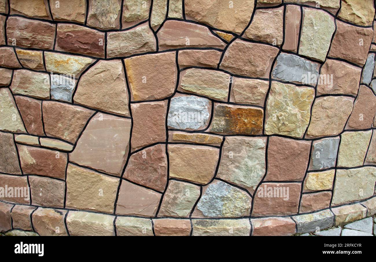 Split and processed red natural stone is used in construction Stock