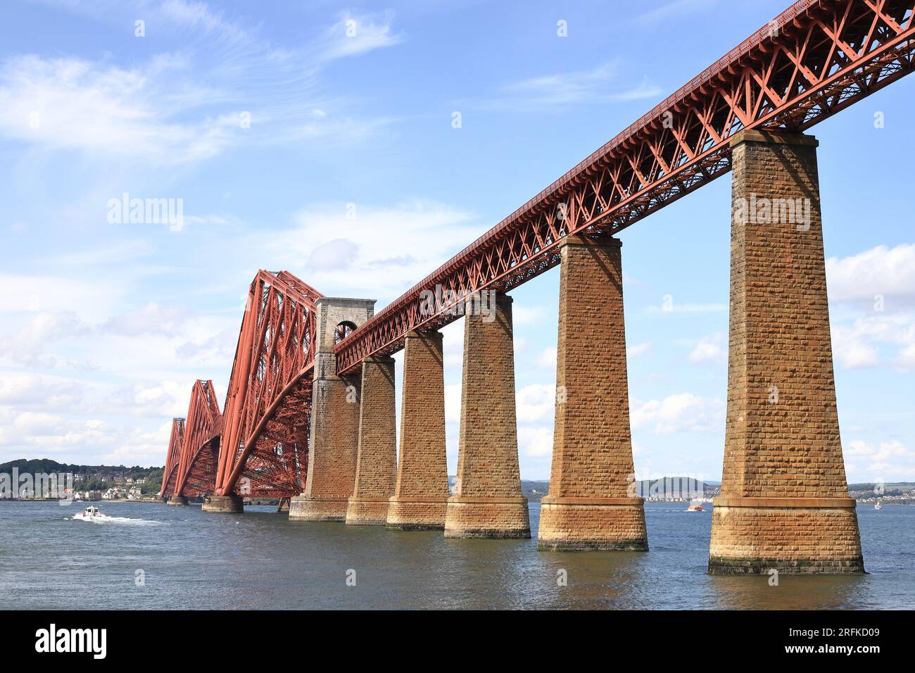 The view from South Queensferry in the east of Scotland towards the Forth Bridge.  The cantilever railway bridge crosses the Firth of Forth. Stock Photo