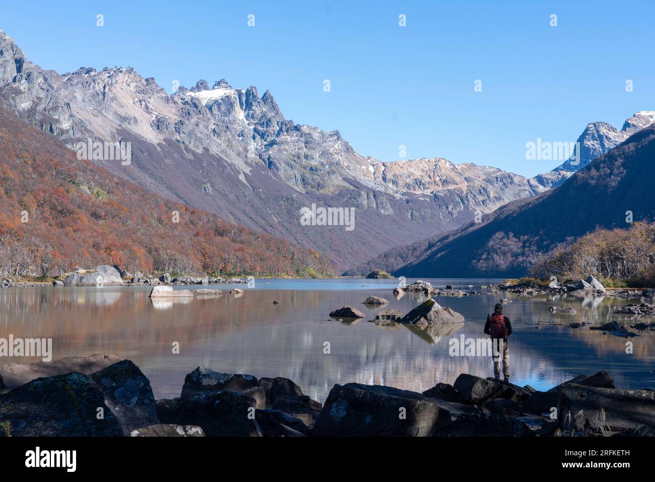 One man standing at the coast of Baguilt Lake in Patagonia Stock Photo