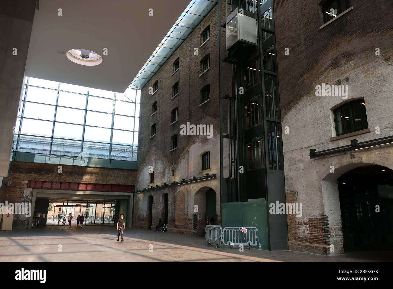 Towering entrance hall in the restored granary building at Central St Martins, a focus for art & design courses at the University of the Arts London. Stock Photo