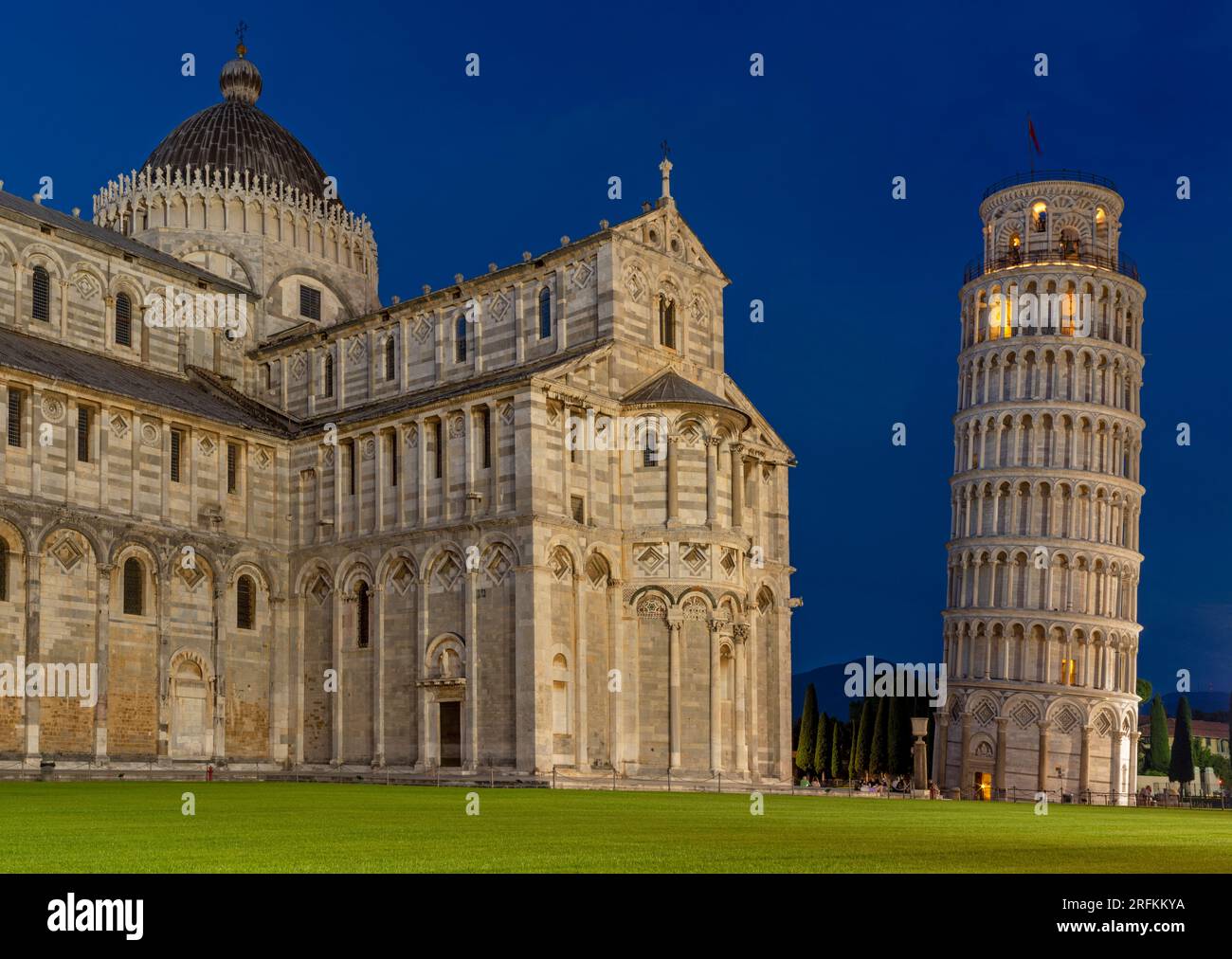The Leaning Tower of Pisa and cathedral shortly after sunset, Pisa, Italy. Stock Photo