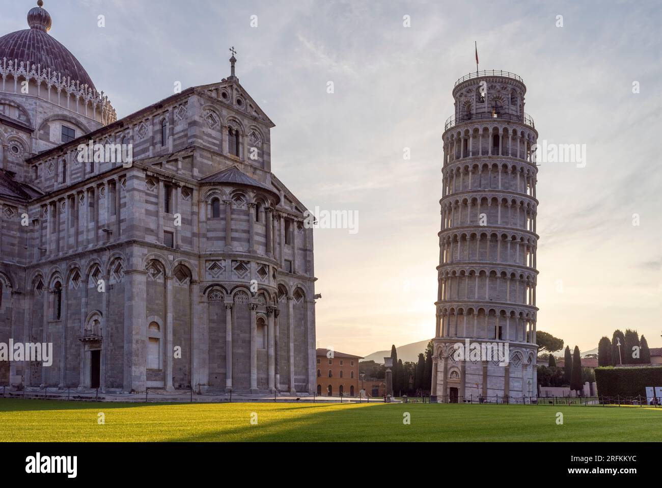 The Leaning Tower of Pisa and cathedral at sunrise, Pisa, Italy. Stock Photo