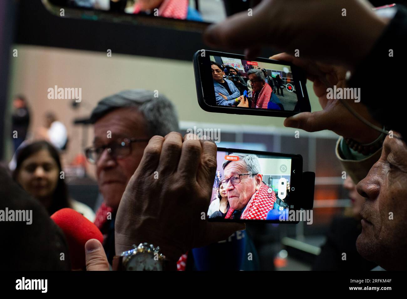 National Liberation Army leader Israel Ramirez, alias 'Pablo Beltran' speaks to the media during a ceremony to begin a six-month cease-fire as part of Stock Photo
