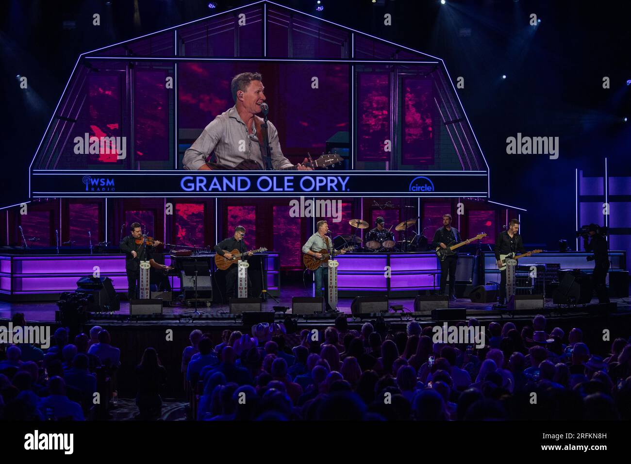 Nashville, United States. 29 July, 2023. Country music artist and U.S. Army veteran Craig Morgan performing onstage at the historic Grand Ole Opry, July 29, 2023 in Nashville, Tennessee, USA. The 59-year-old singer took the oath of service and re-inlisted in the Army Reserves during the show and will serve as a Warrant Officer.  Credit: Lara Poirrier/U.S Army Photo/Alamy Live News Stock Photo
