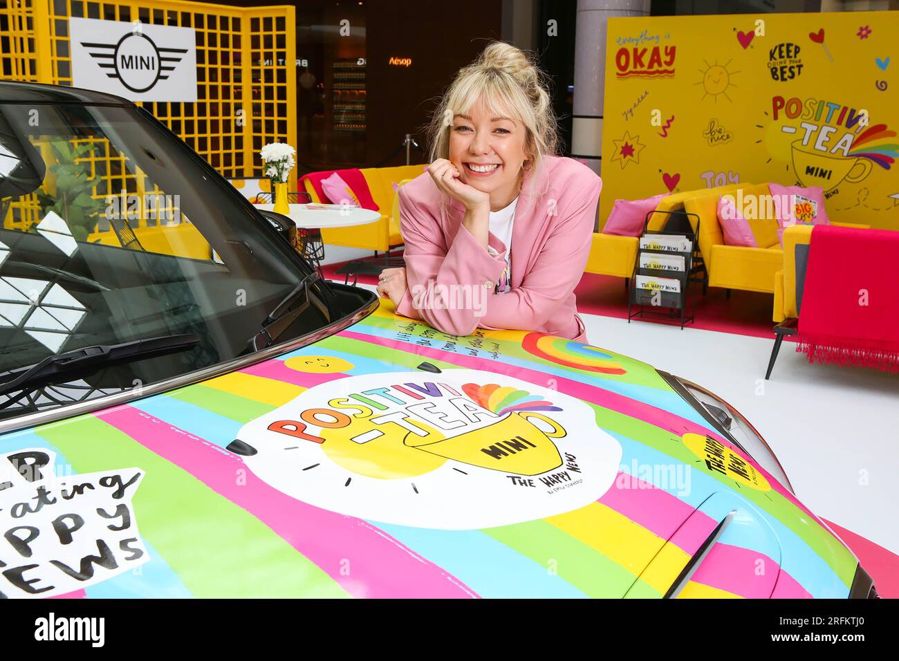 EDITORIAL USE ONLY Happiness expert and illustrator Emily Coxhead at the ‘Positivi-Tea Room’, unveiled by MINI at Westfield London to encourage people to restore, reinvigorate, and recharge for International Happiness Month. Picture Date: Friday August 4, 2023. Stock Photo