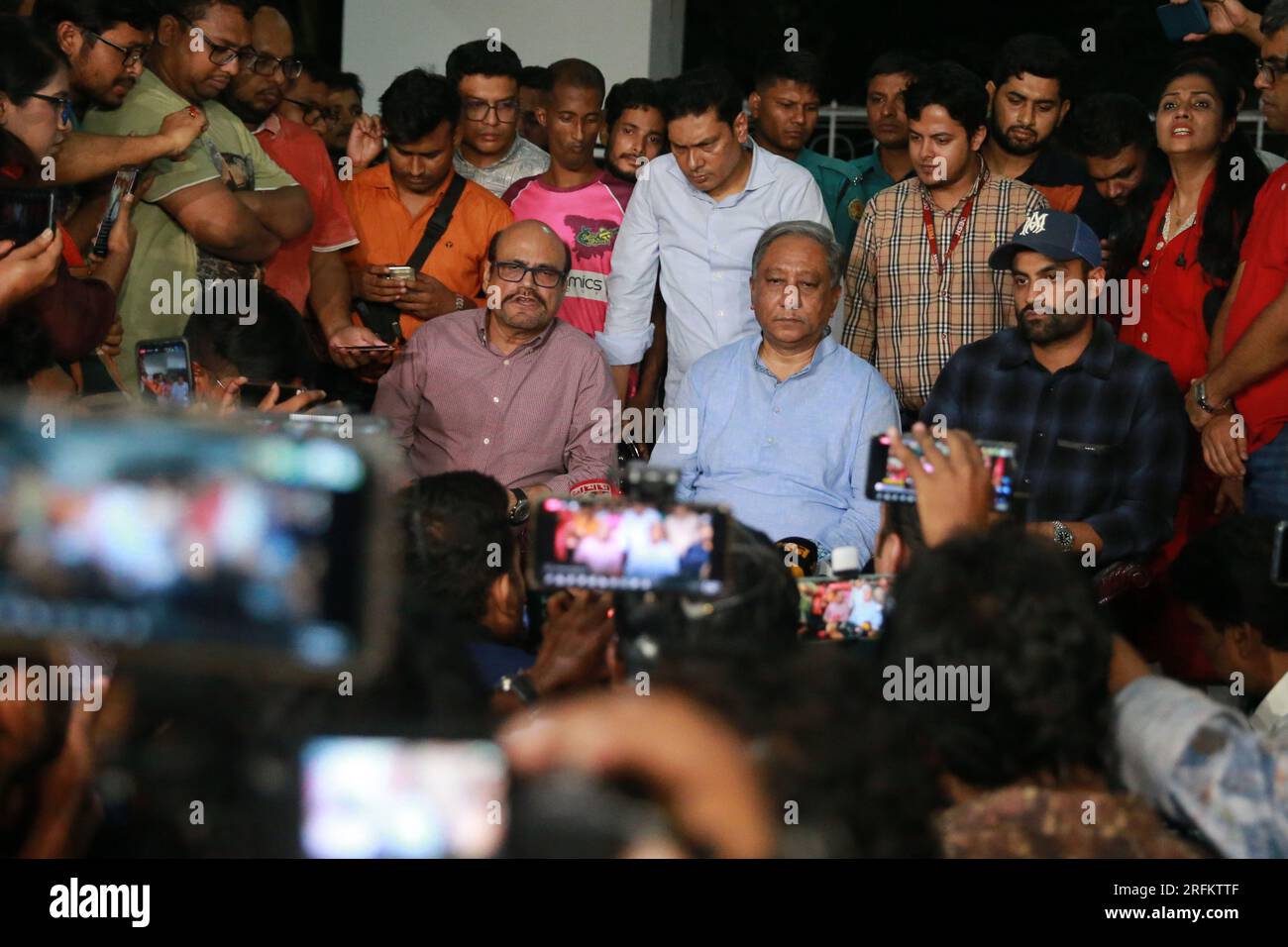 Cricket Operations Chairman Jalal Yunus (L) speaks during a press conference where Bangladesh ODI skipper Tamim Iqbal (R) announced his stepped down f Stock Photo
