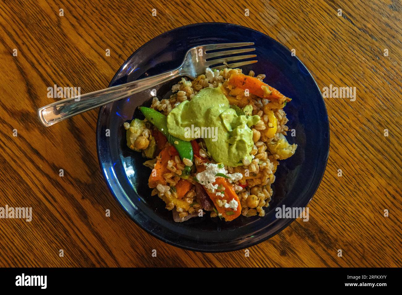 farro vegetable salad with green goddess dressing Stock Photo Alamy