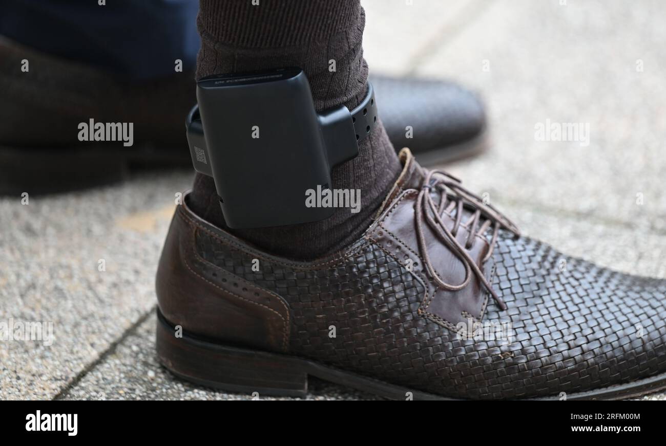 Weiterstadt, Germany. 04th Aug, 2023. A man wears an electronic