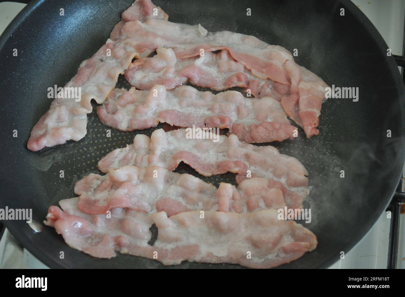 04 August 2023/Tulip original bacon and grocery receipt in danish