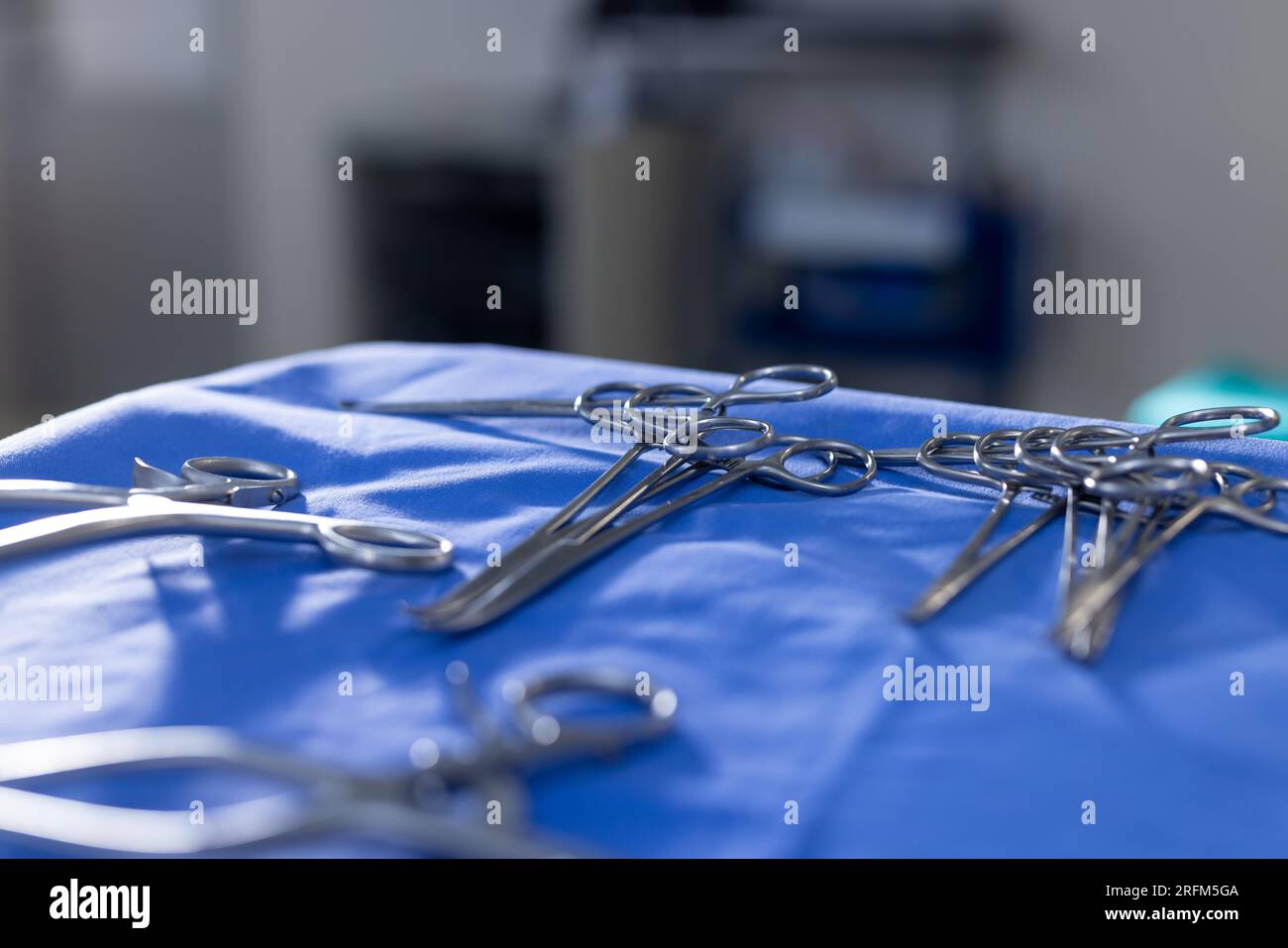 Close up of surgical instruments on table in operation theater at hospital Stock Photo