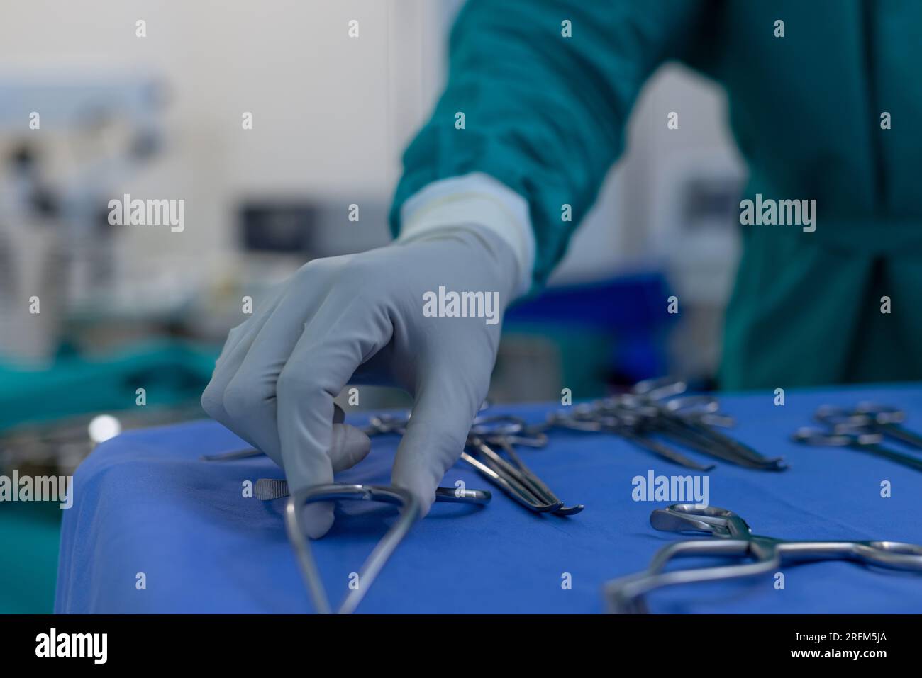Close up of african american male surgeon preparing surgical