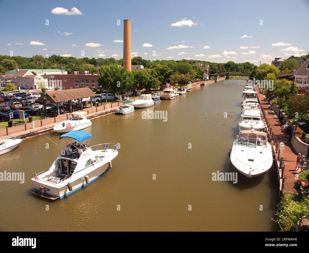 Scenes along the Erie Canal in Fairport, New York with canal boats and