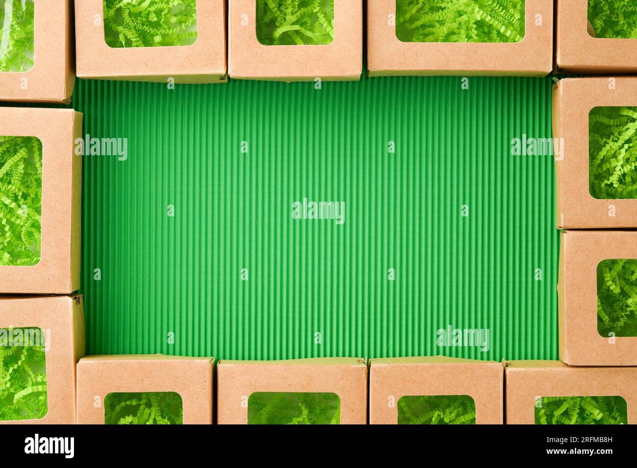 Green Friday backgrounds mock up. Sale Tag on green background. Paper shopping boxes and green tag. Environmentally friendly shopping idea, useful thi Stock Photo