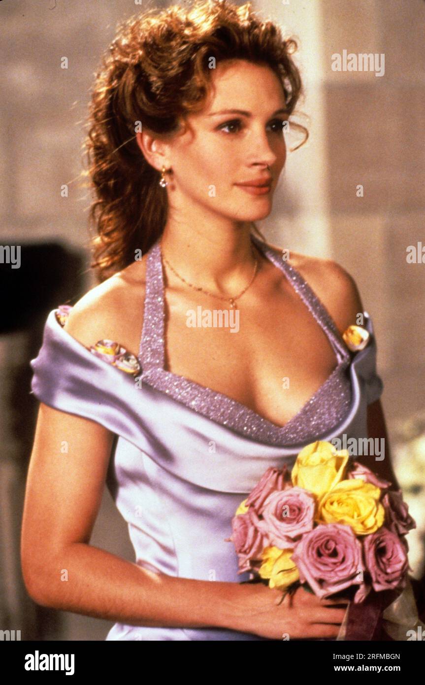 julia roberts purple dress A purple DREAM! Julia Roberts ravishing lavender satin gown in My Best Friends Wedding (1997). , -Costume design by Jeffrey Kurland. Notable works of his include Inception (2010) and