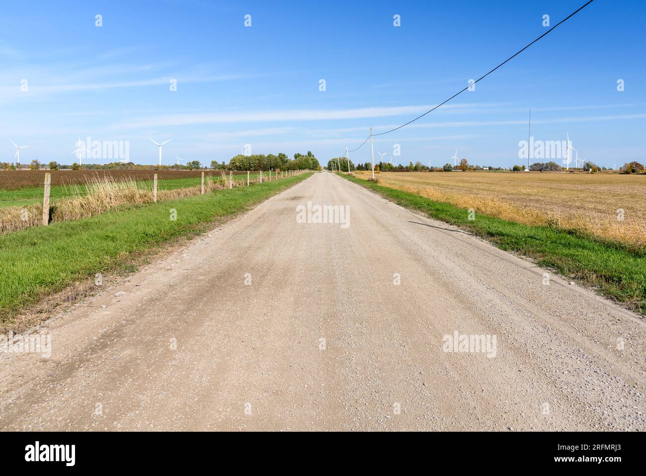Top view scenic winding country road through green farmland. Clip. Aerial  rural road countryside Stock Photo - Alamy