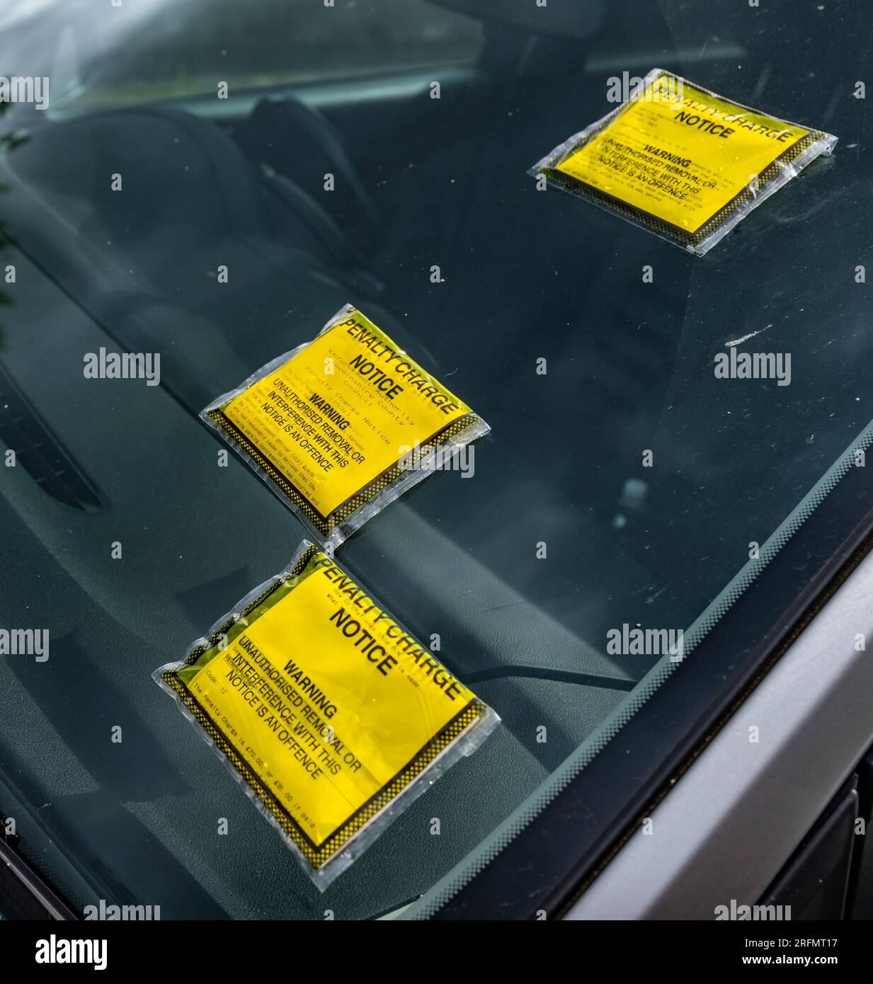 Parking tickets on car windshields hires stock photography and images