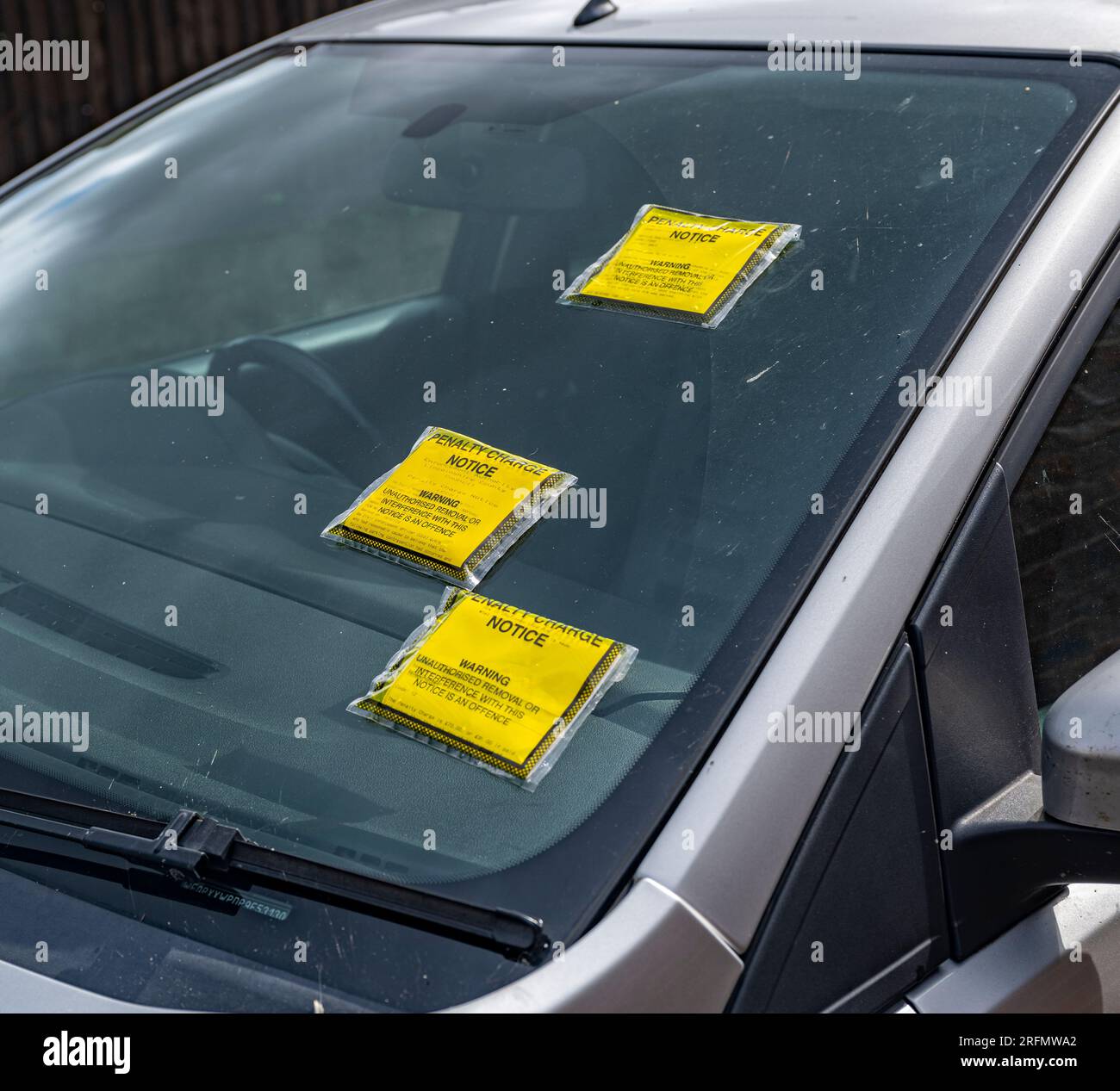 Parking tickets on car windshields hires stock photography and images