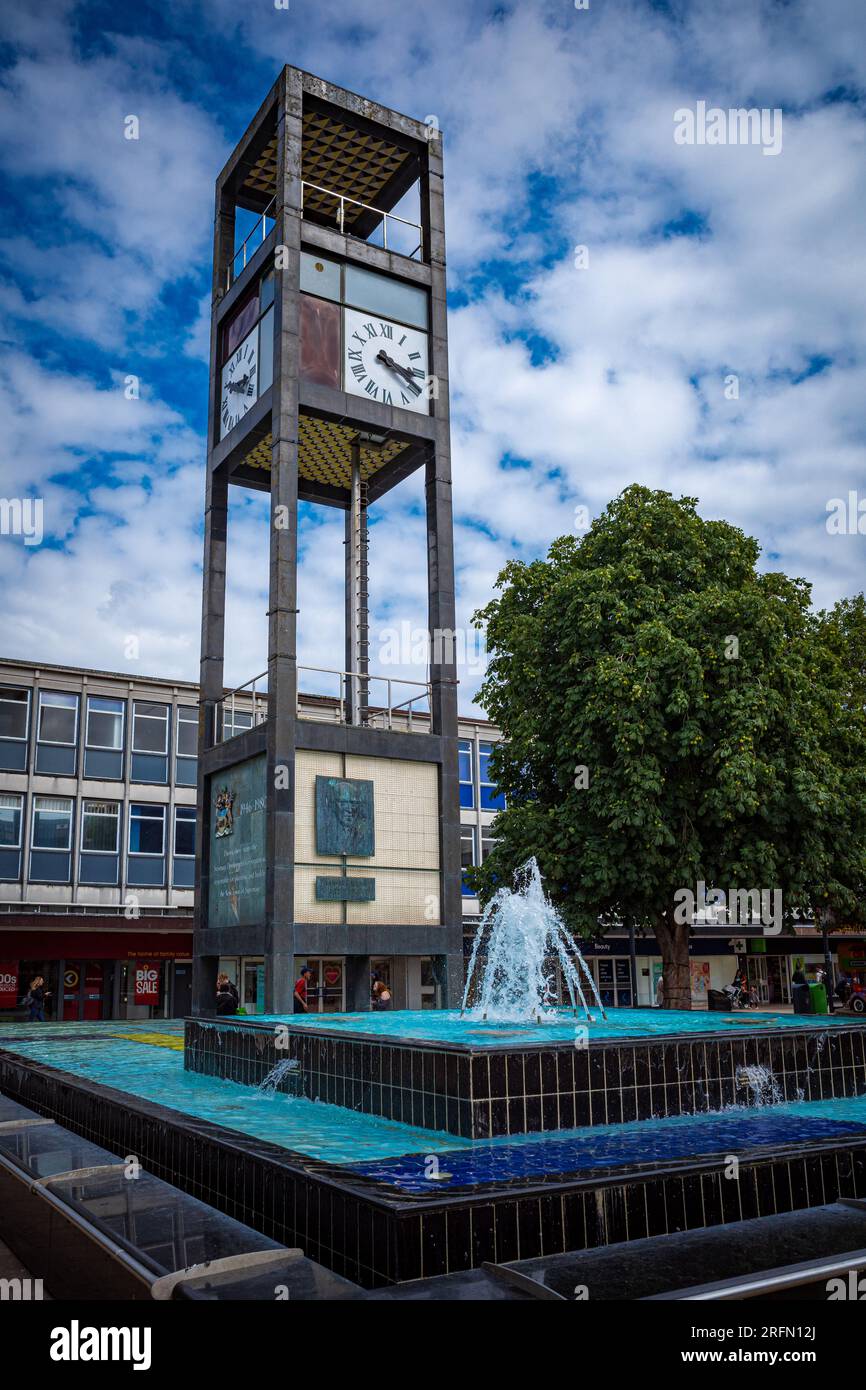 Stevenage New Town Centre - clock tower erected in Stevenage Town Square pedestrianised shopping area, opened in 1959. Grade II listed. Stock Photo