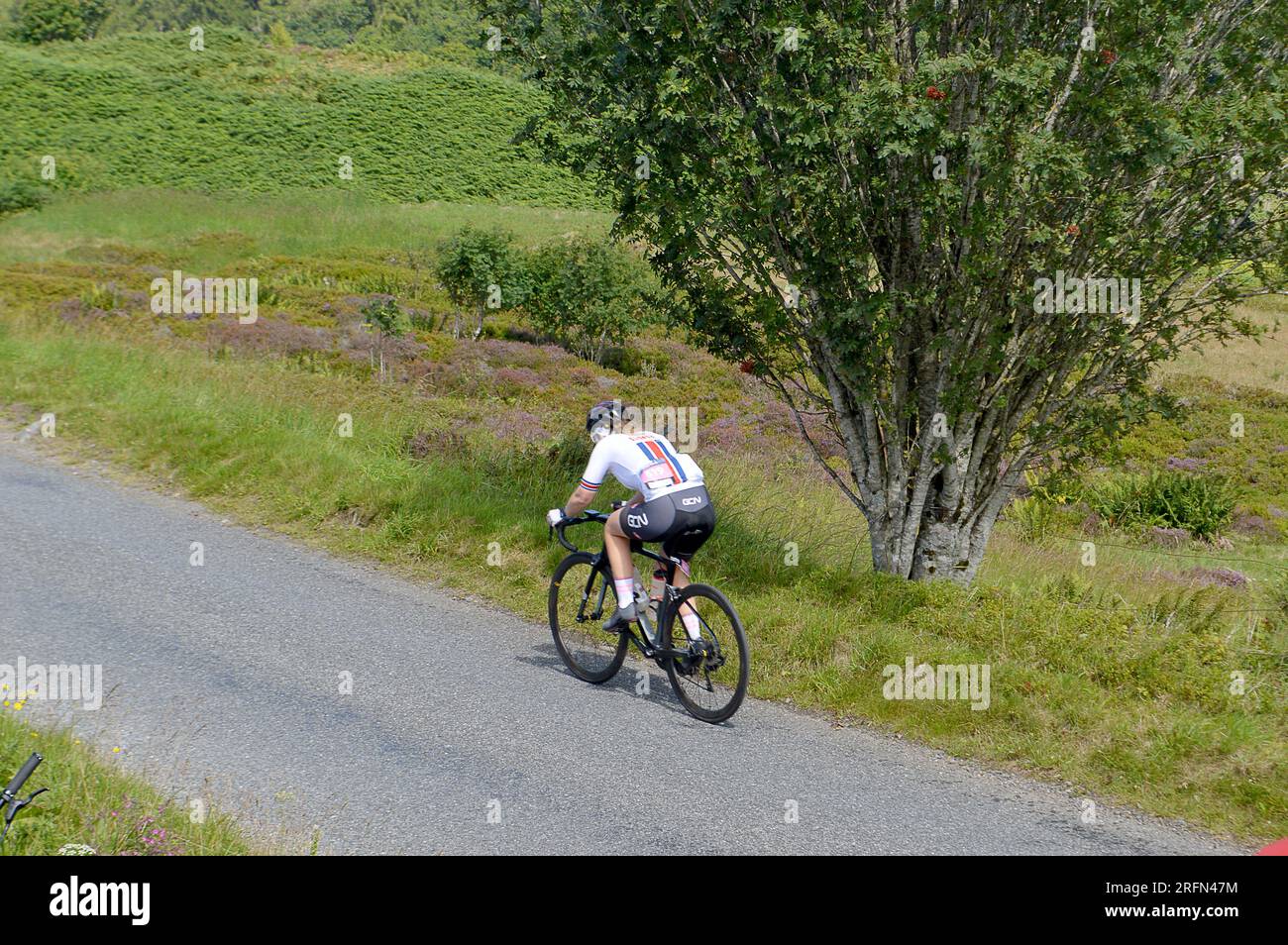 SMA' GLEN, PERTHSHIRE, SCOTLAND: 4 AUGUST 2023; Rider entering the Sma' Glen during the 160km Gran Fondo at the UCI World Cycling Championships Stock Photo