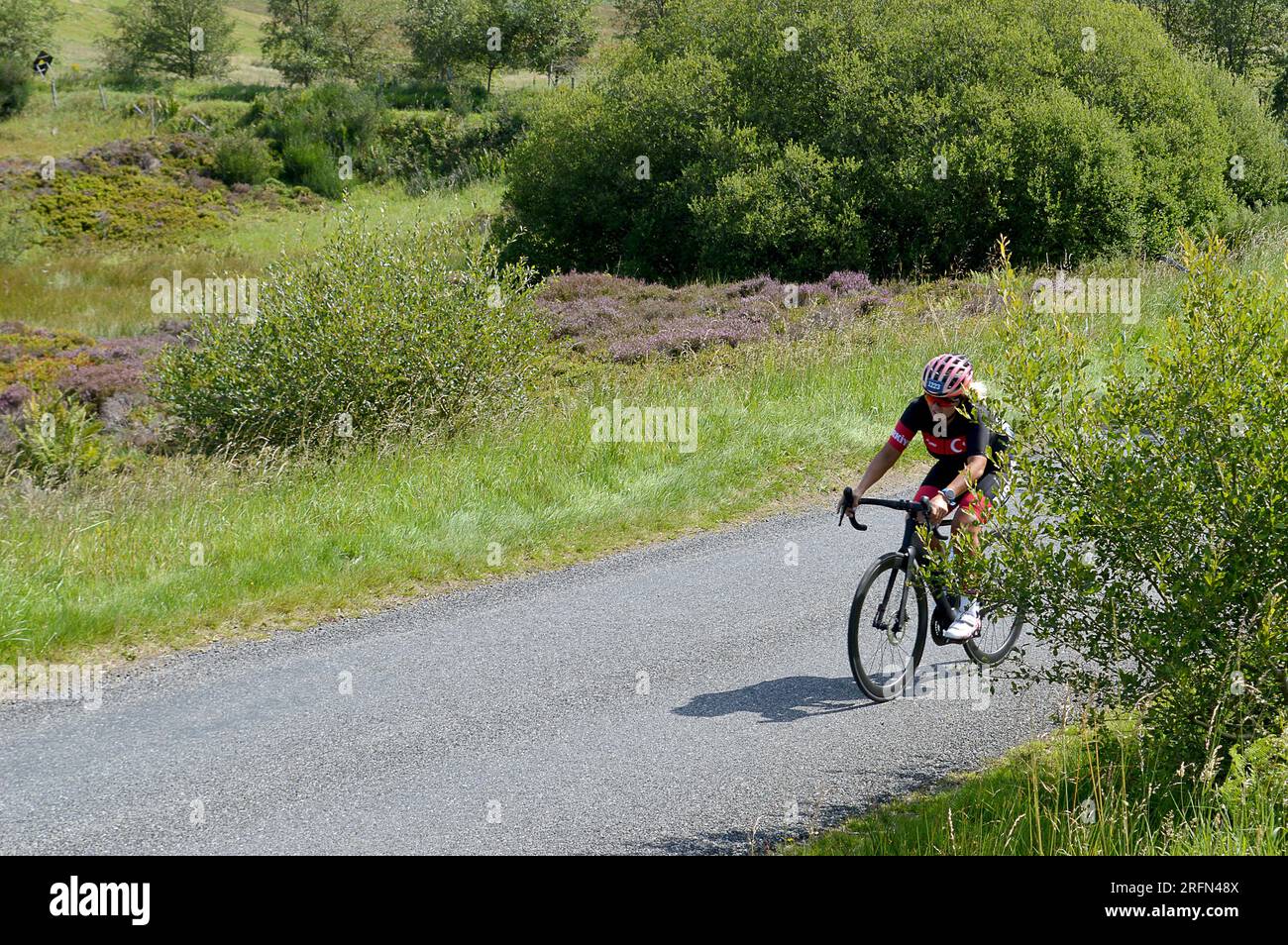 SMA' GLEN, PERTHSHIRE, SCOTLAND: 4 AUGUST 2023; Rider entering the Sma' Glen during the 160km Gran Fondo at the UCI World Cycling Championships Stock Photo