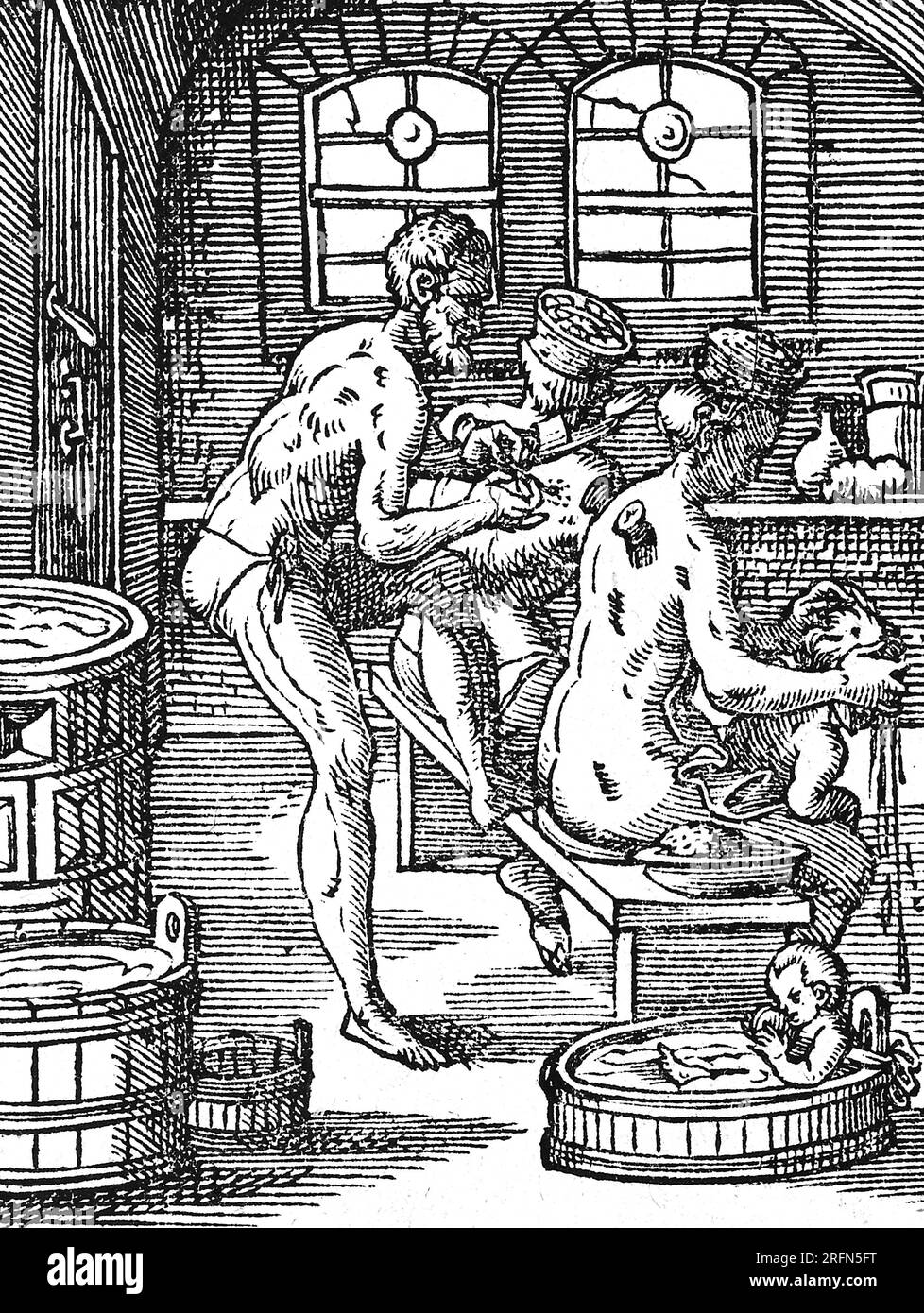 A bath-house in which the attendant bathes his customers and applies cupping glasses to their backs. Woodcut from Jost Amman's Book of Trades, 1568. Stock Photo