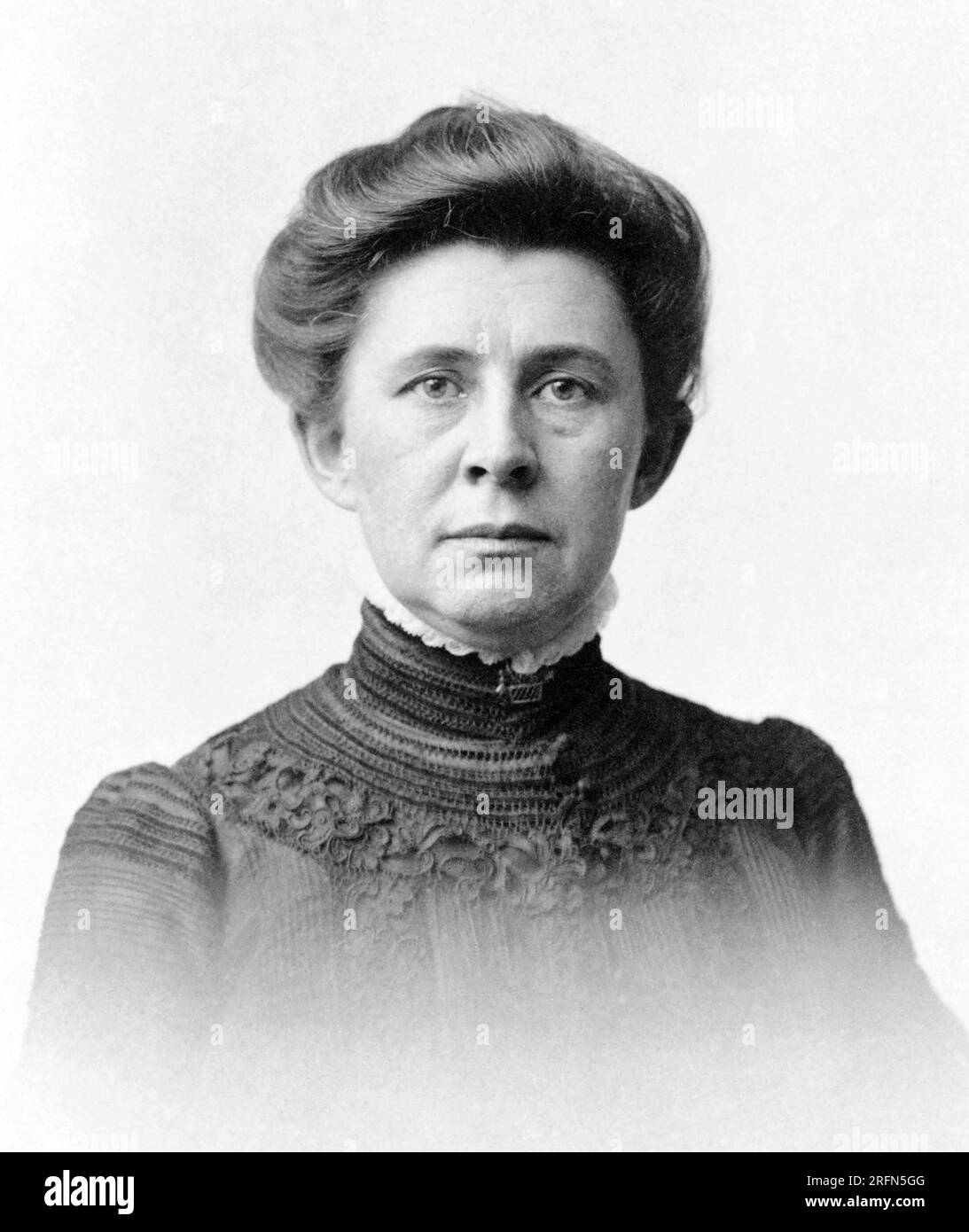 Ida Tarbell (1857-1944) was an American writer and pioneer of investigative journalism, best known for her 1904 book The History of the Standard Oil Company, a work that contributed to the dissolution of the Standard Oil monopoly and helped usher in the Hepburn Act of 1906, the Mann-Elkins Act, the creation of the Federal Trade Commission (FTC), and passage of the Clayton Antitrust Act. Photo, c. 1904 by James E. Purdy. Stock Photo