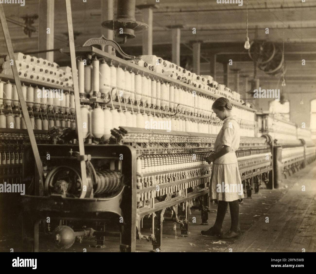 Fourteen year old spinner, Brazos Valley Cotton Mill, West Texas