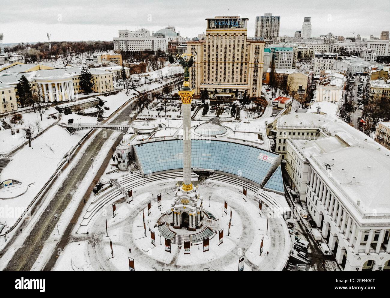 Maidan Nezalezhnosti square in Kyiv.Aerial drone photo of Statue of Independence in center of Maydan Square.Gold statue on high marble column in capit Stock Photo