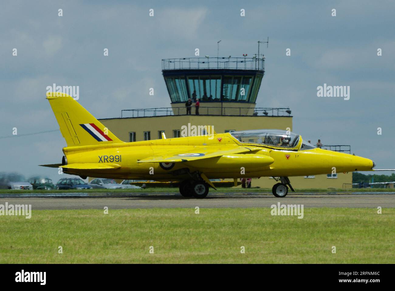 Hawker Siddeley Gnat T1 jet trainer plane in RAF Yellowjacks colours 'XR991' G-MOUR at Cotswold Airport, formerly RAF Kemble, UK. Folland Gnat plane Stock Photo