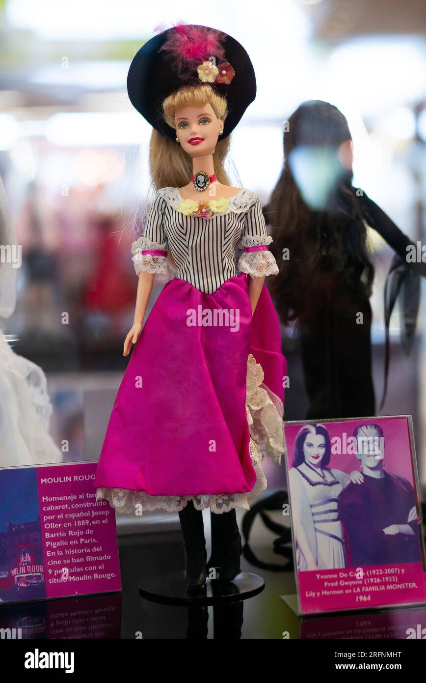 A Barbie doll is displayed at the 'Barbie Film and Fashion' exhibition, more than 200 Barbie dolls, paying homage to show business and fashion, on Aug Stock Photo