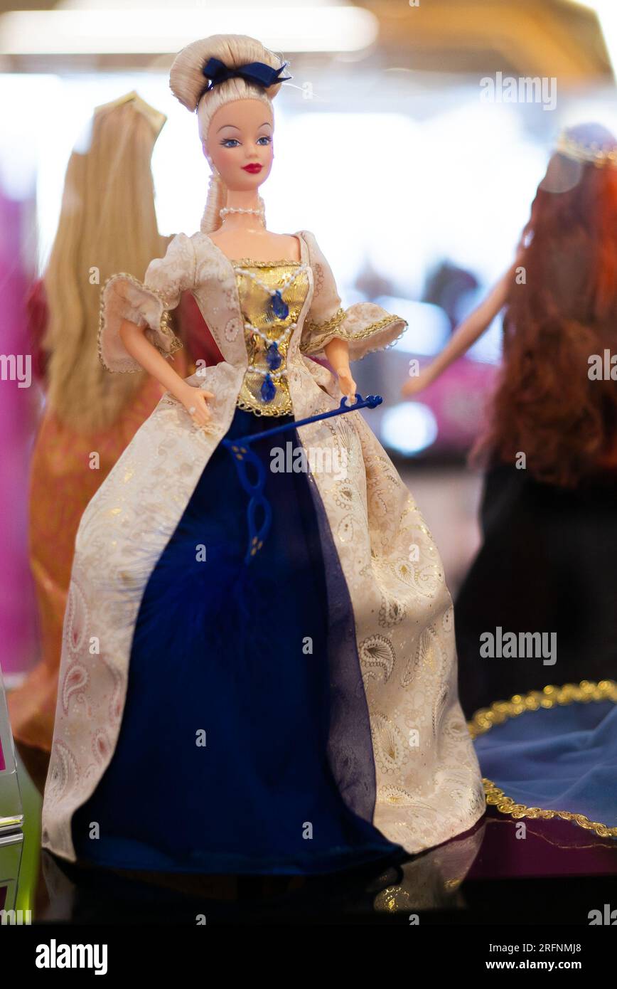 A Barbie doll is displayed at the 'Barbie Film and Fashion' exhibition, more than 200 Barbie dolls, paying homage to show business and fashion, on Aug Stock Photo