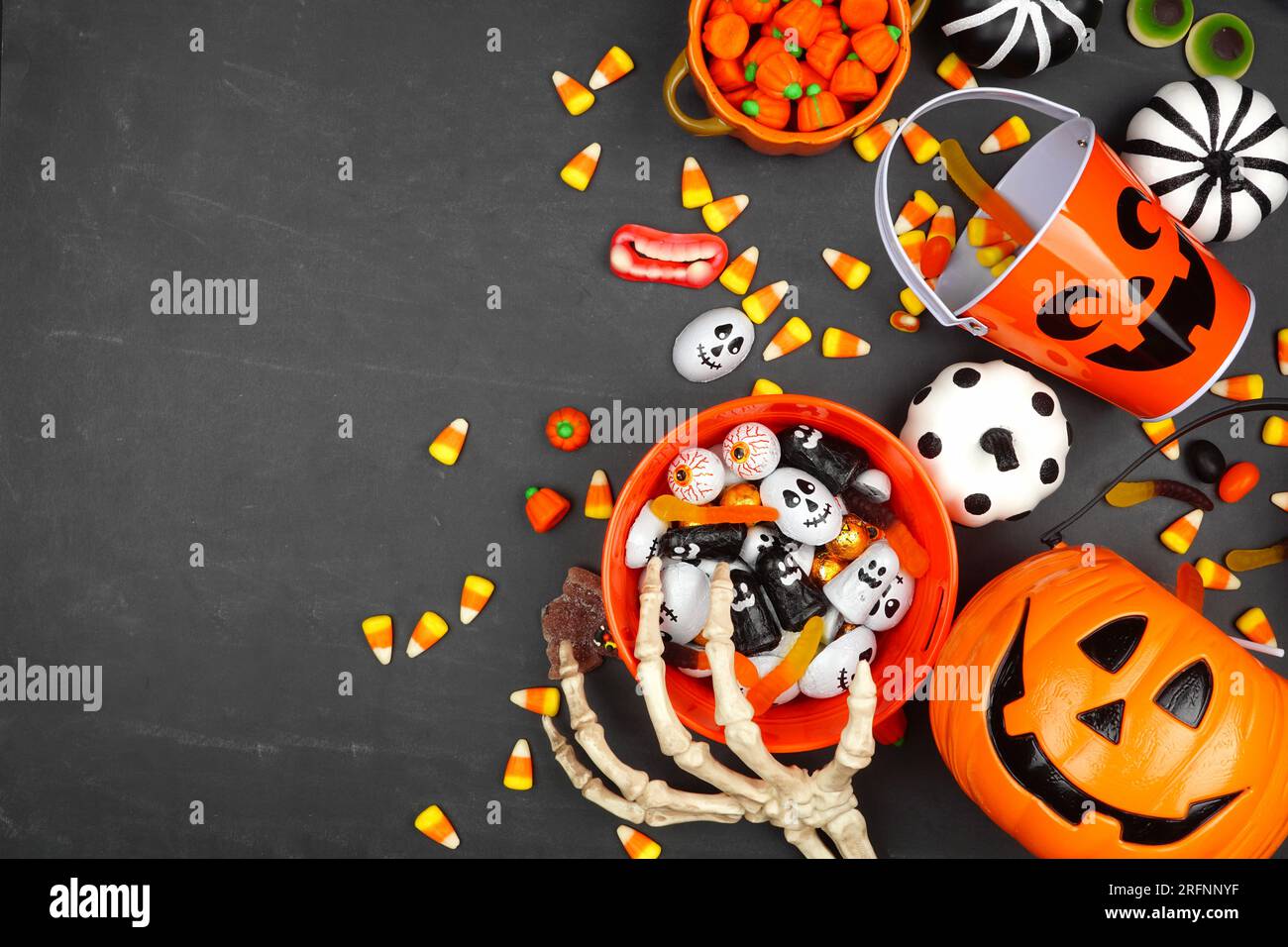 Halloween trick or treat side border with jack o lantern pails and ...