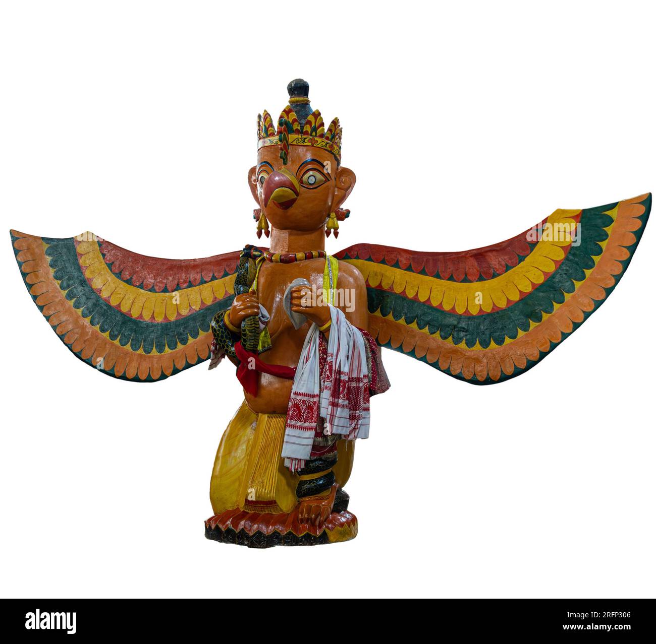 Isolated photo of a statue of Garuda, the vahana of Vishnu, from Auniati Satra (monastery) on Majuli Island, Assam, India. Garuda's arm is draped with Stock Photo