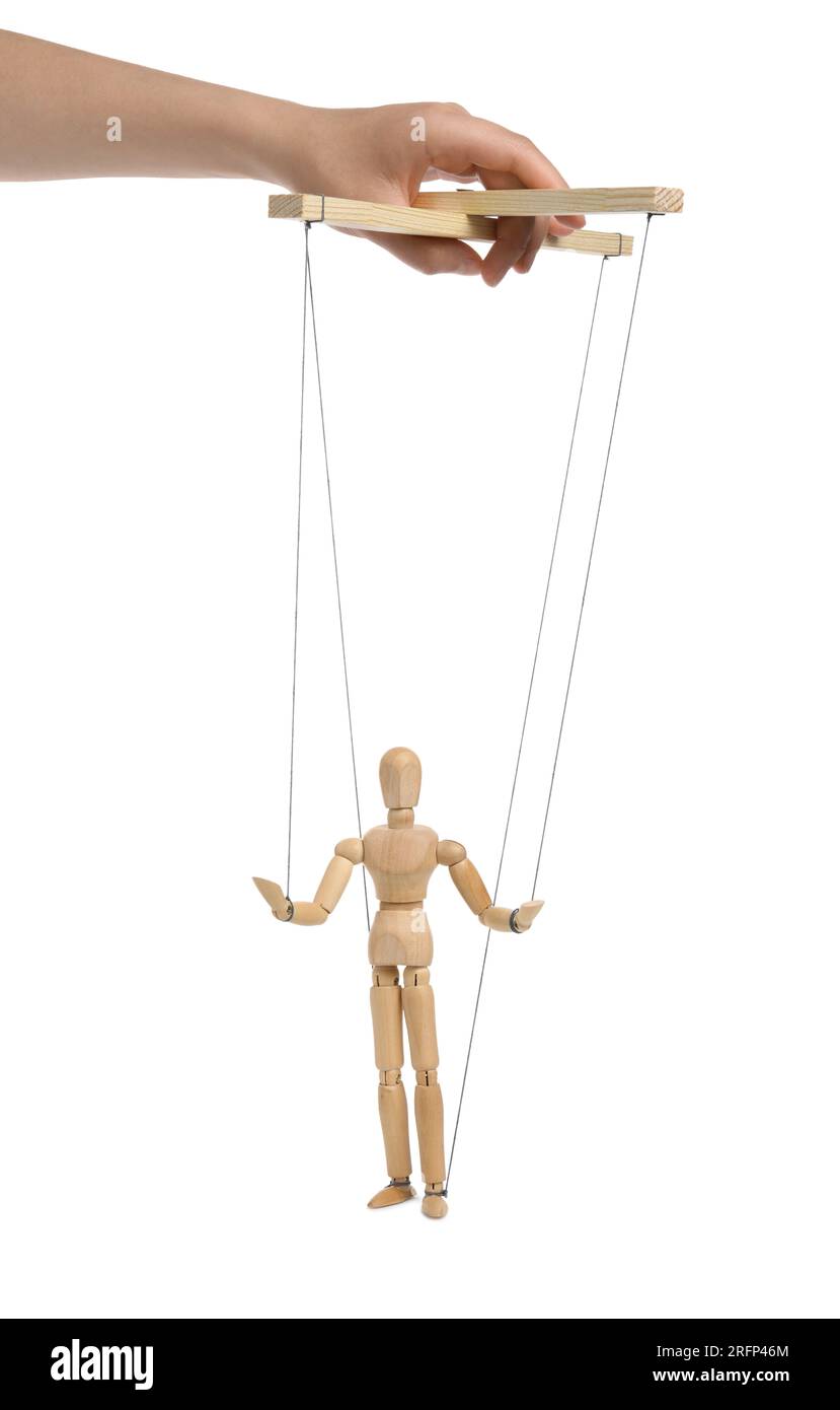 Woman pulling strings of puppet on white background, closeup Stock Photo -  Alamy