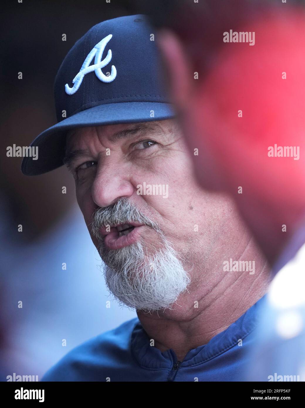 Atlanta Braves pitching coach Rick Kranitz talks with starter Max