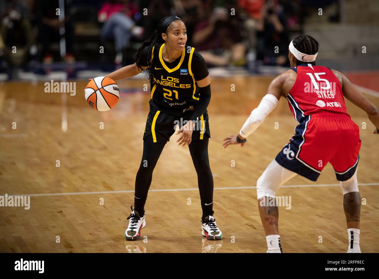 Los Angeles Sparks guard Jordin Canada brings the ball up court