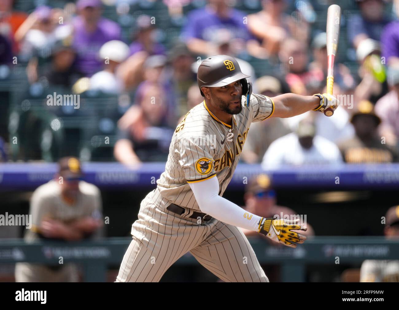 Xander Bogaerts of the San Diego Padres runs after hitting a double in  2023