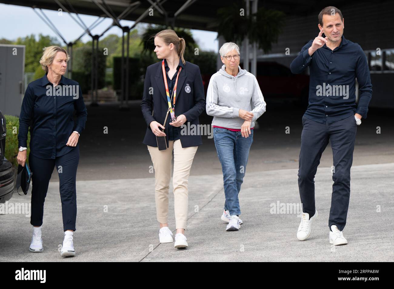Wyong, Australia. 05th Aug, 2023. Soccer, women: World Cup, final press conference Germany: Martina Voss-Tecklenburg (l-r), national coach of the German women's national soccer team, Sonja Alger, press officer of the DFB women's national team, Sabine Mammitzsch, DFB vice president for women's and girls' soccer, and Panagiotis 'Joti' Chatzialexiou, sporting director national teams, arrive at the press conference. Credit: Sebastian Christoph Gollnow/dpa/Alamy Live News Stock Photo
