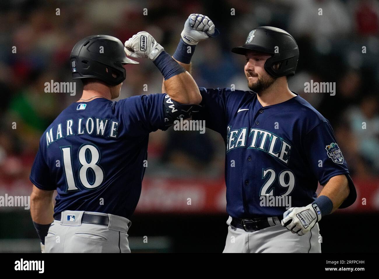 Seattle Mariners designated hitter Cal Raleigh (29) celebrates