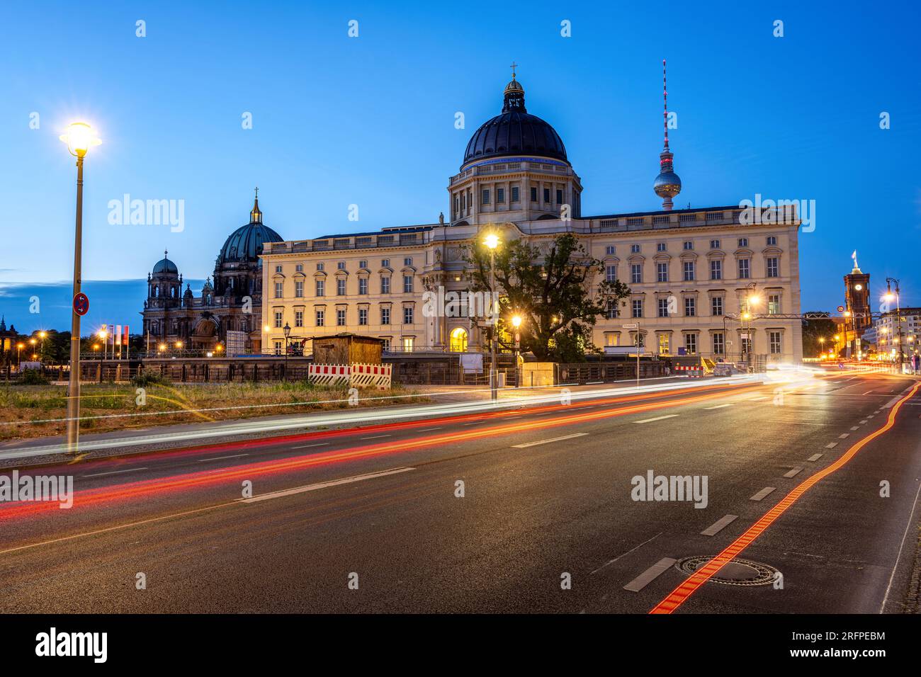 The rebuilt Berlin City Palace, the famous TV Tower and the Cathedral at night Stock Photo
