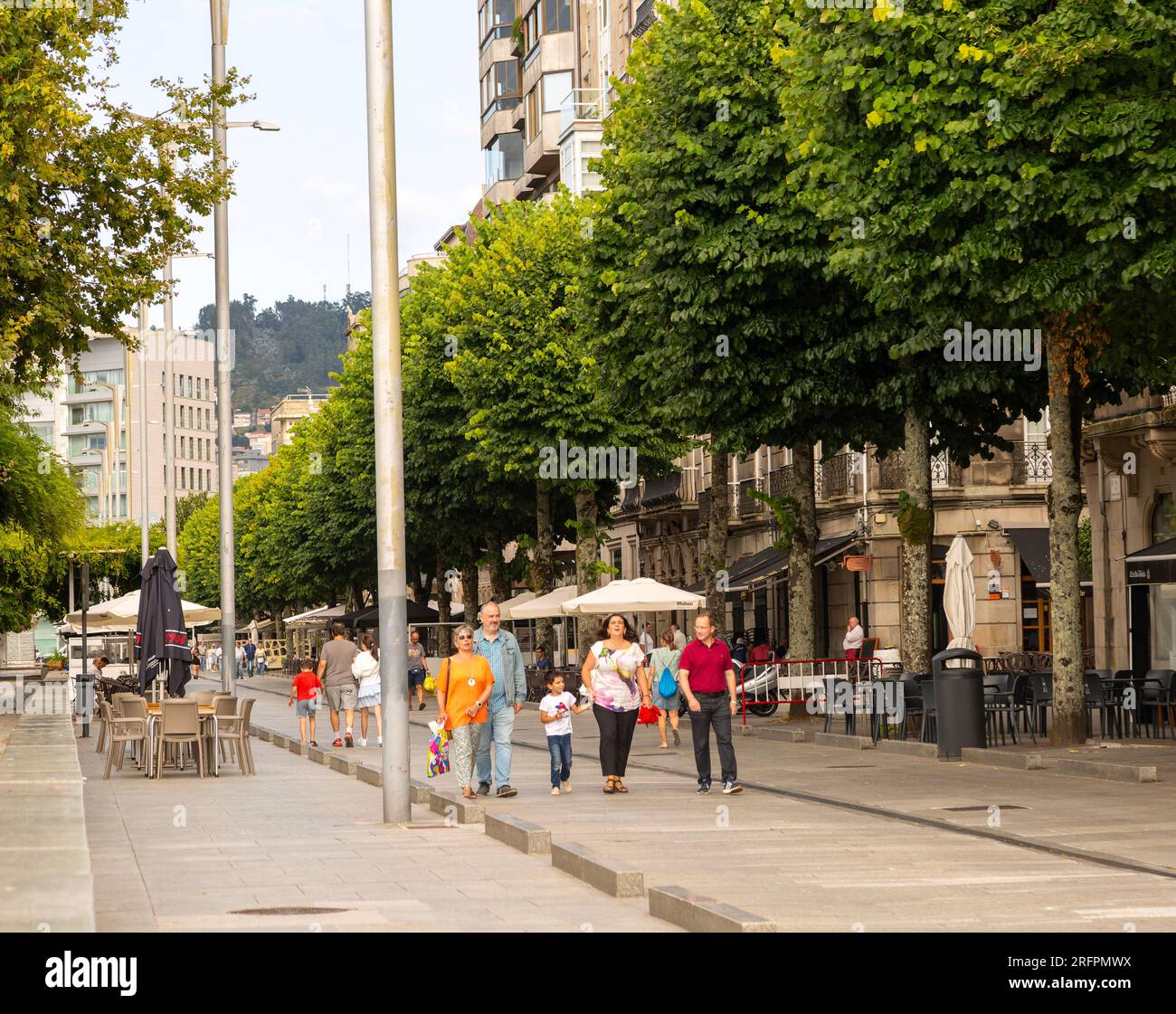 People walking along pedestrianised street  Rua Montero, city centre of Vigo, city of Vigo, Galicia, Spain Stock Photo