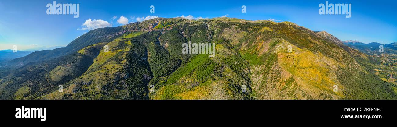 total aerial view of Monte Morrone and a grove of yellow colored brooms. Maiella National Park, Abruzzo, Italy, Europe Stock Photo