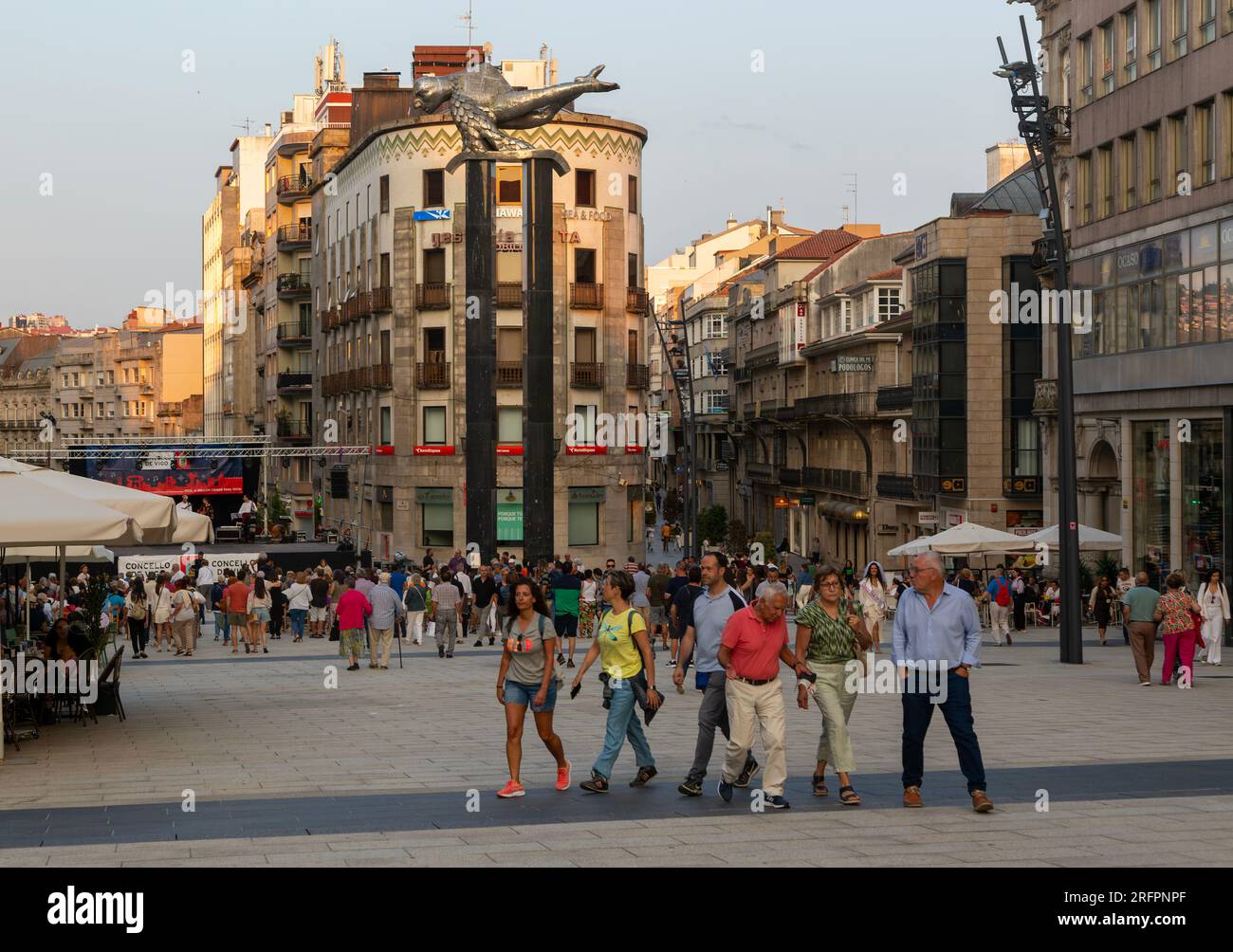 People in pedestrianised central square, Praza Porto do Sol plaza, city centre of Vigo, Galicia, Spain Stock Photo