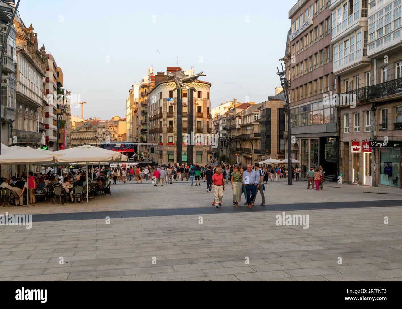 People in pedestrianised central square, Praza Porto do Sol plaza, city centre of Vigo, Galicia, Spain Stock Photo