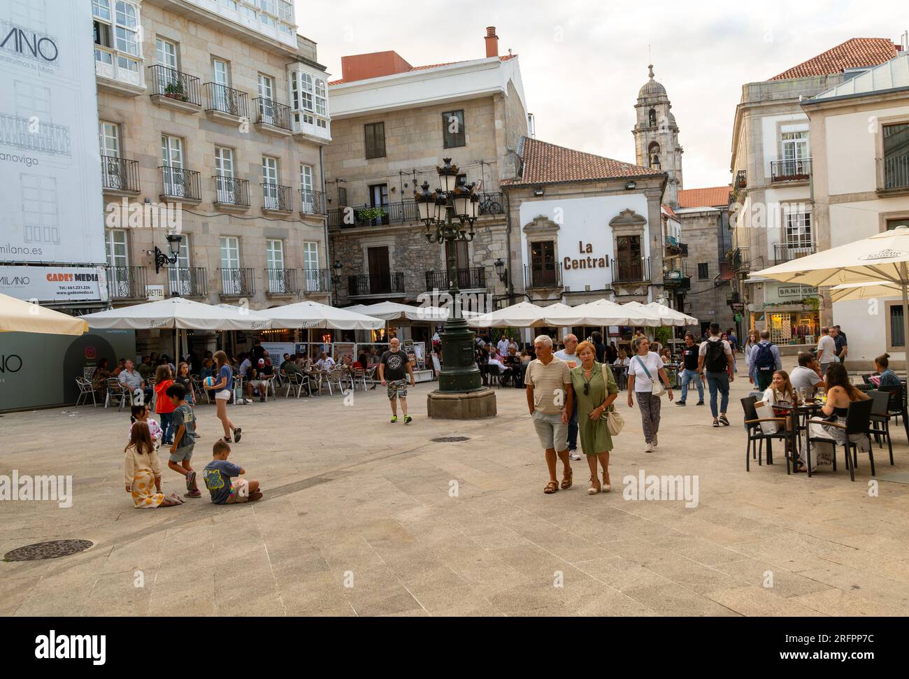 People and street cafes bars, Plaza de la Constitucion square, old town city centre of Vigo, Galicia, Spain Stock Photo