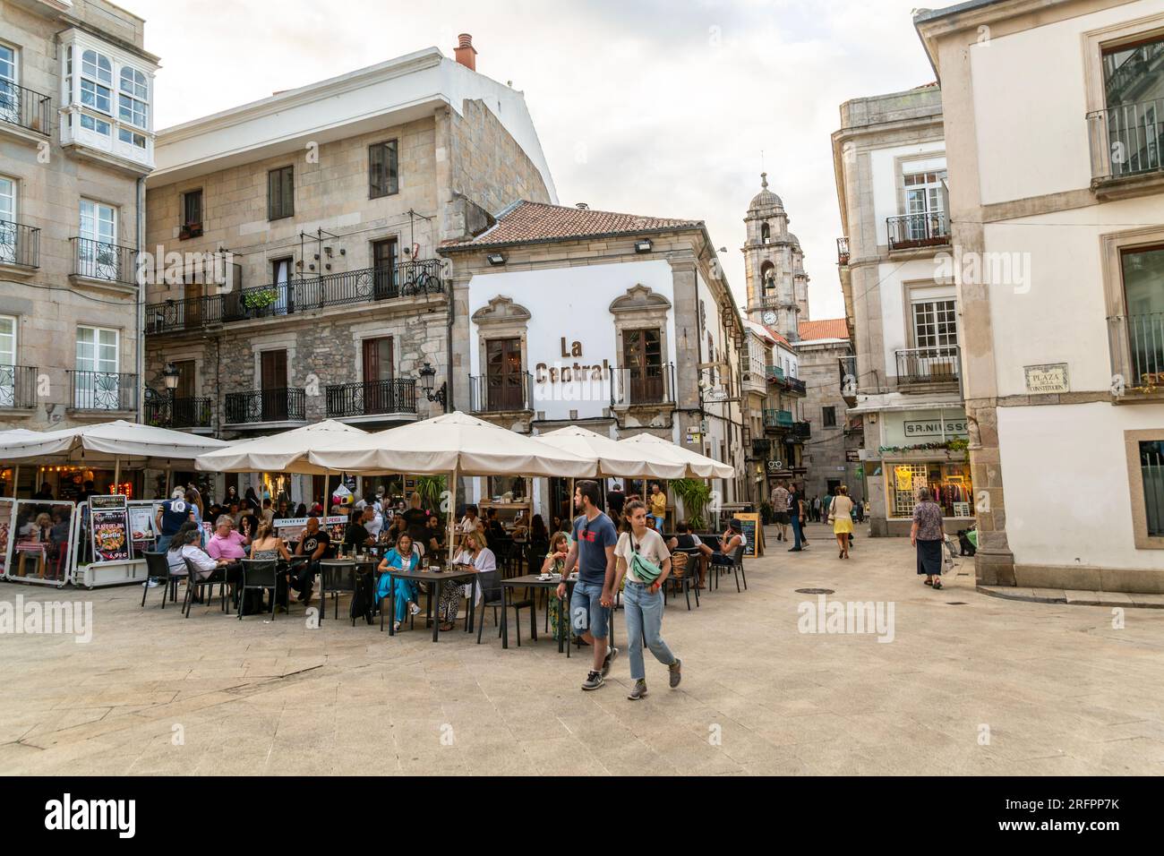 People and street cafes bars, Plaza de la Constitucion square, old town city centre of Vigo, Galicia, Spain Stock Photo