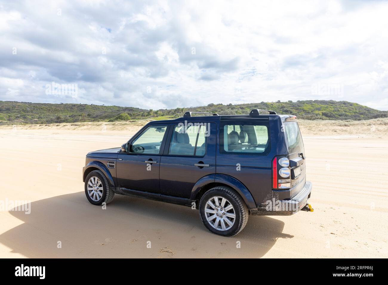 75 mile beach on Fraser Island K'gari, Land Rover Discovery 4 property released drives on the sand highway road,Queensland,Australia Stock Photo