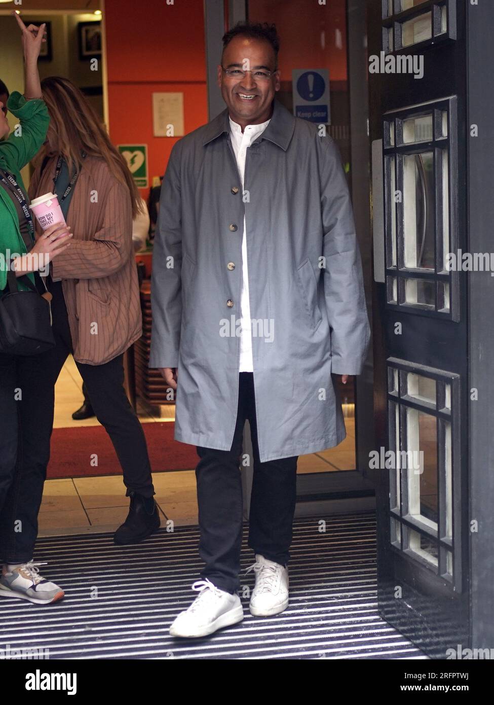 Krishnan Guru-Murthy leaves Wogan House in London, after he was