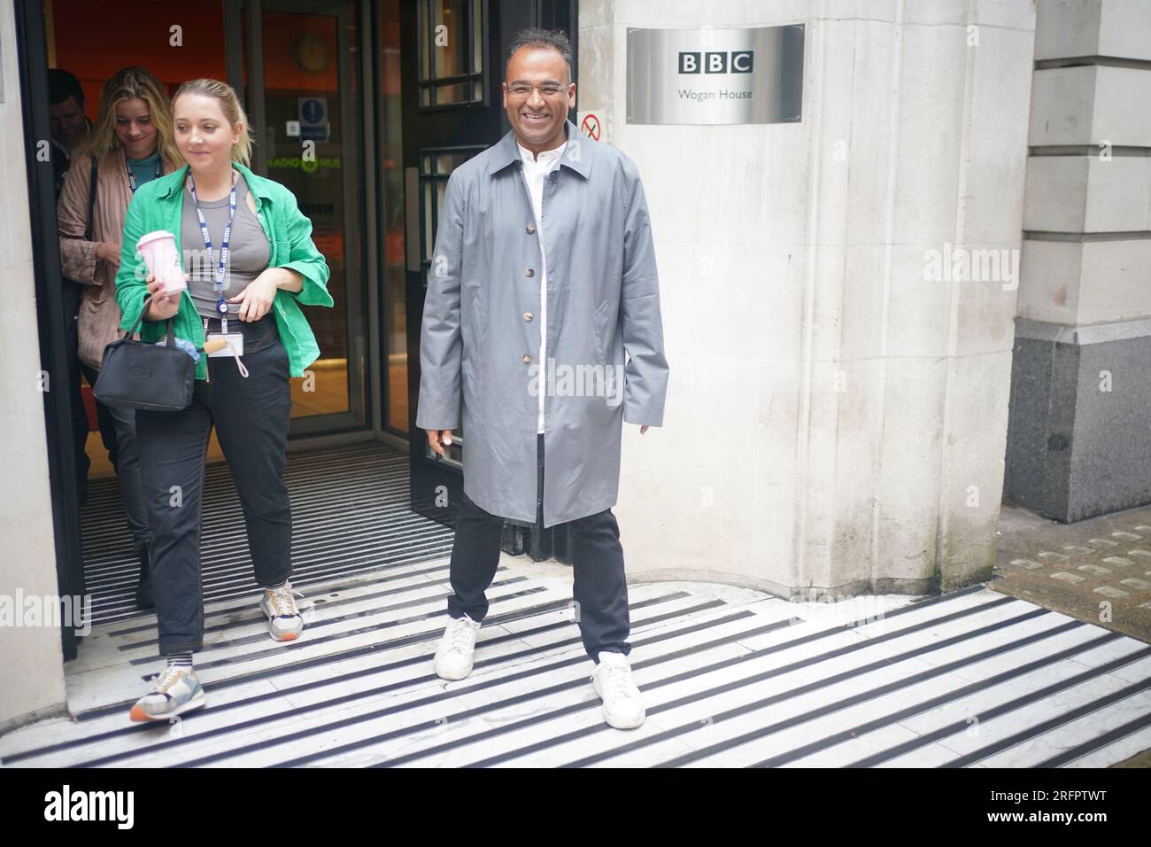 Krishnan Guru-Murthy leaves Wogan House in London, after he was