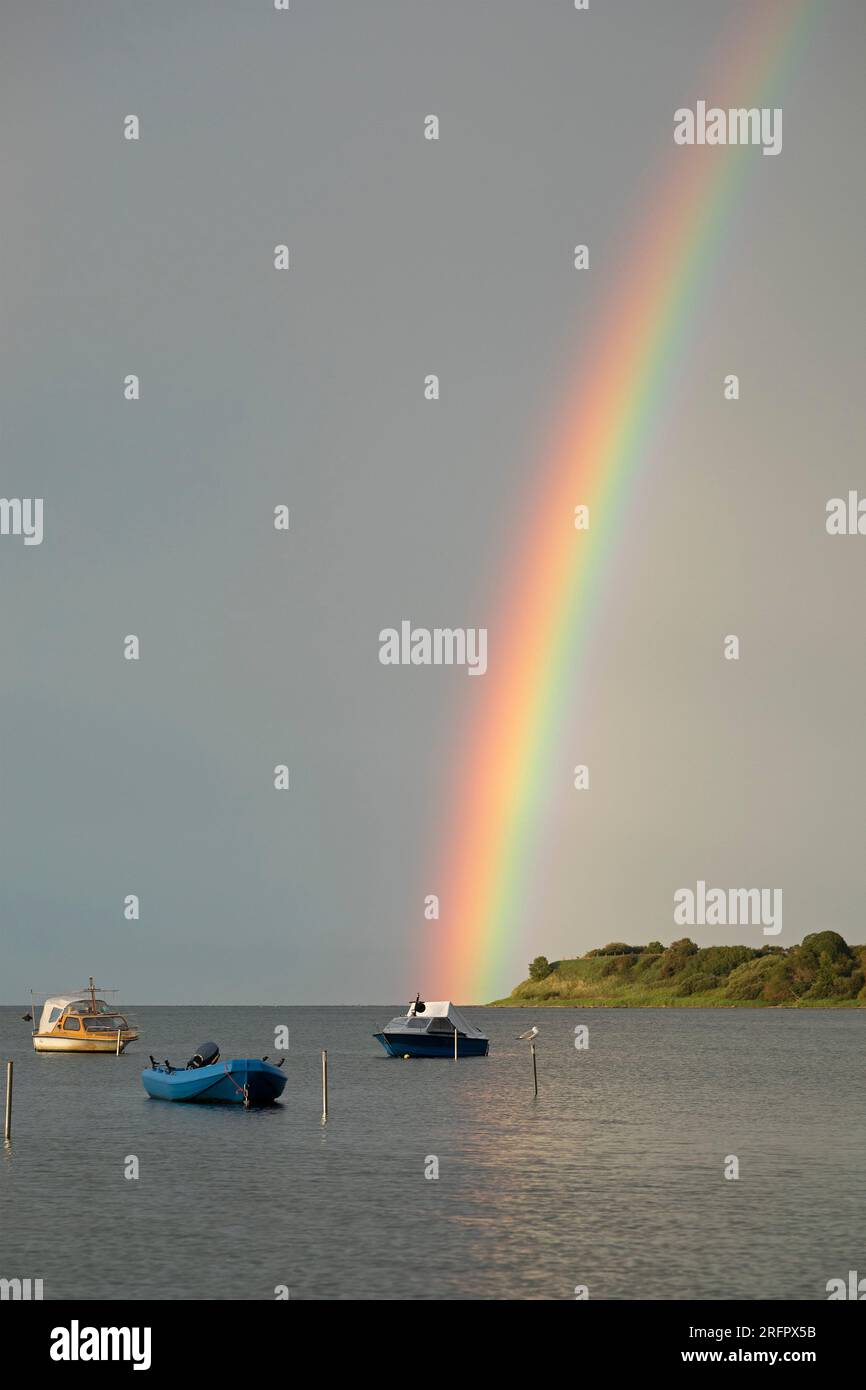 Rainbow above Baltic Sea, boats, Habernis, Steinberg, Schleswig-Holstein, Germany Stock Photo